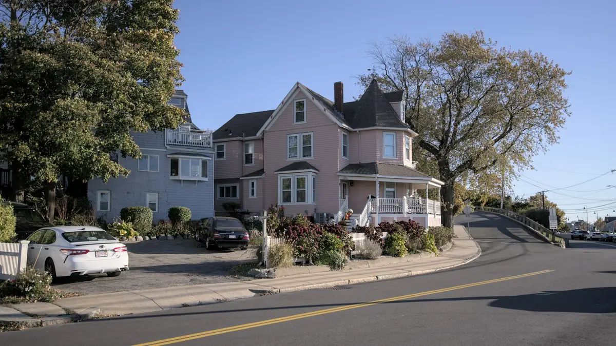 Victorian houses along a curving residential street - Leak Detection in Beachmont